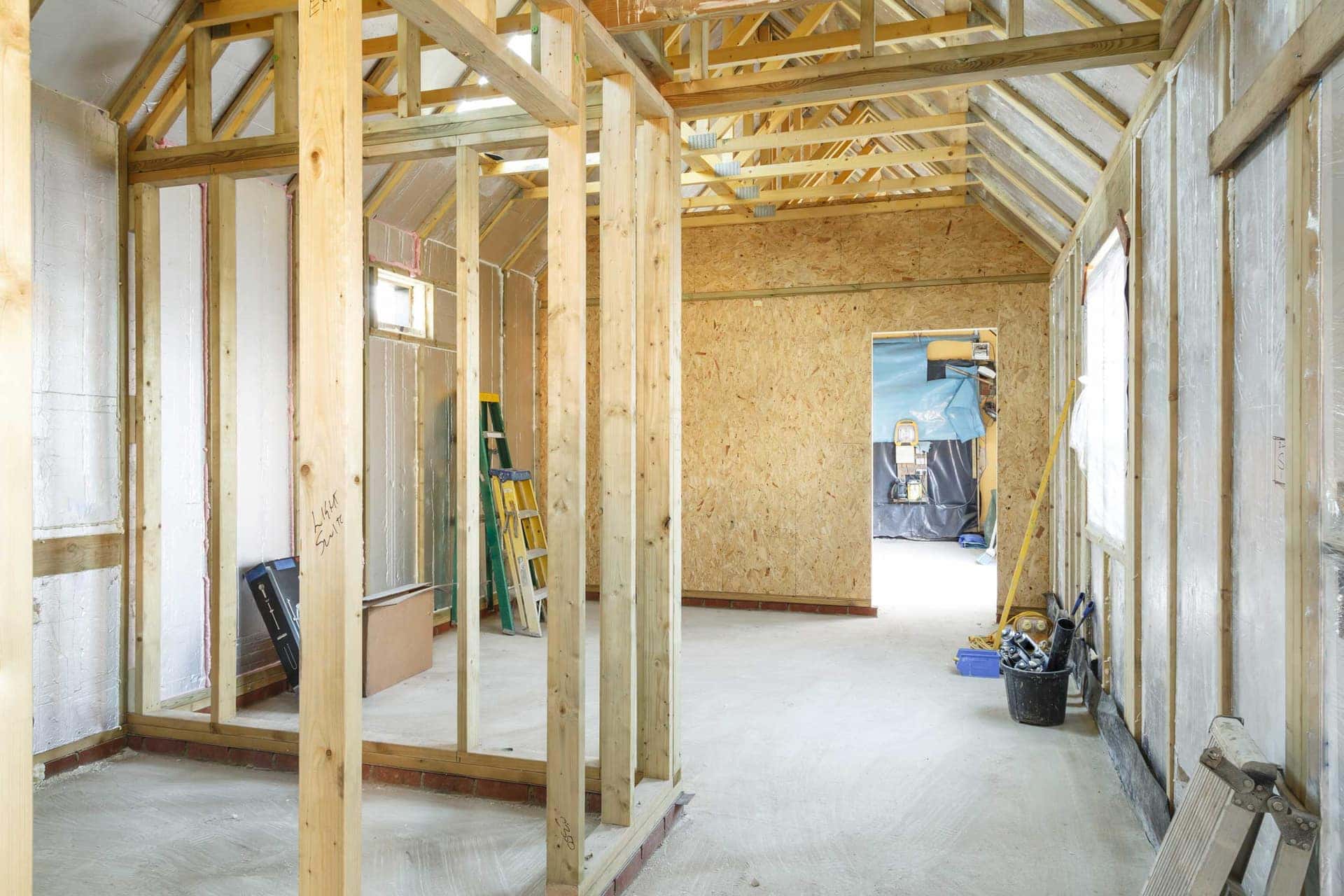 Timber frame partitions under construction inside a new build